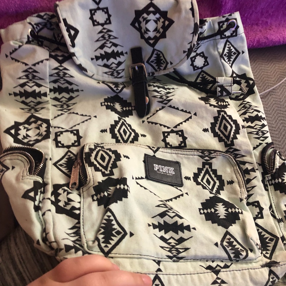 PINK backpack vs. white and black
